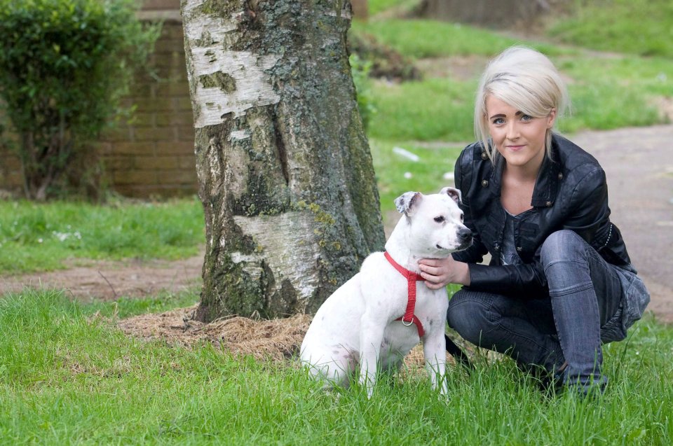 In 2012 Riley posed with her pet Staffie named Pups who she described as the 'worlds worst dog'