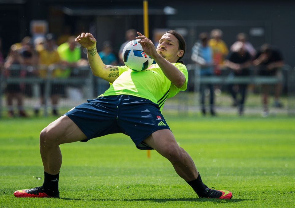  Sweden forward and captain Zlatan Ibrahimovic controls the ball on his chest at his side's Euro 2016 training camp in Bastad before holding a press conference