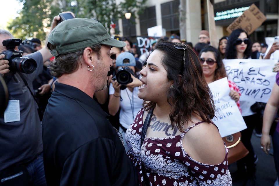  Supporters and protesters faced up to one another in anger