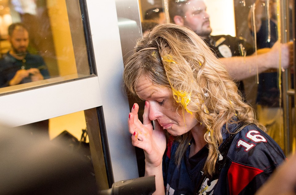  A woman was pelted with raw eggs outside Donald Trump's rally in San Jose