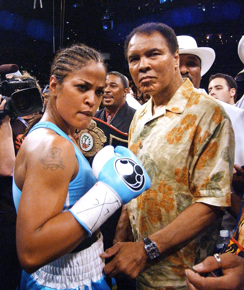 Muhammad Ali congratulating daughter Laila on her win in 2005