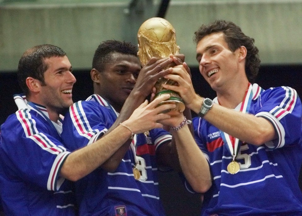 Laurent Blanc, right, celebrates winning the 1998 World Cup with Zinedine Zidane, left, and Marcel Desailly