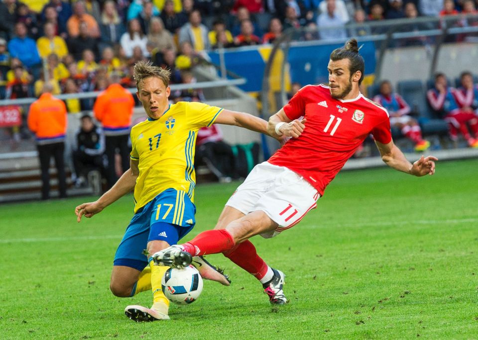 Star Gareth Bale vies for the ball during Wales's friendly against Sweden