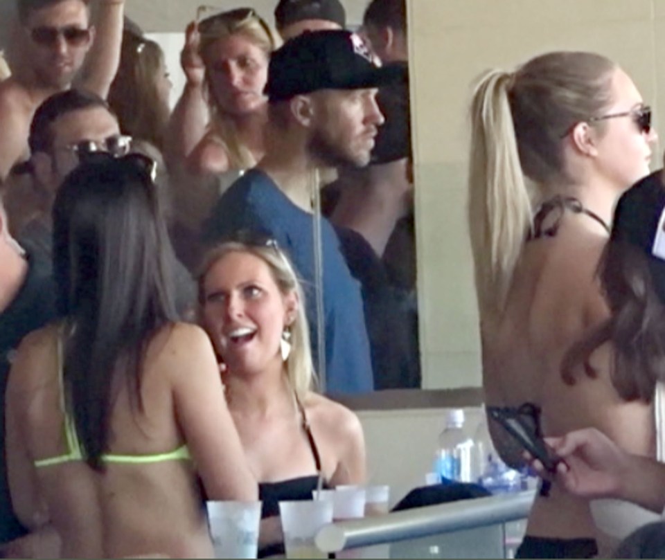 He looked relaxed at he hung out with bikini-clad babes