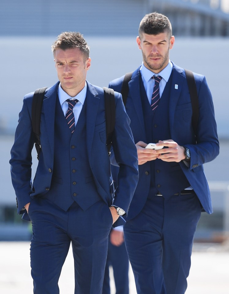  Team-mates Jamie Vardy and Fraser Forster each have crest sewn onto suit