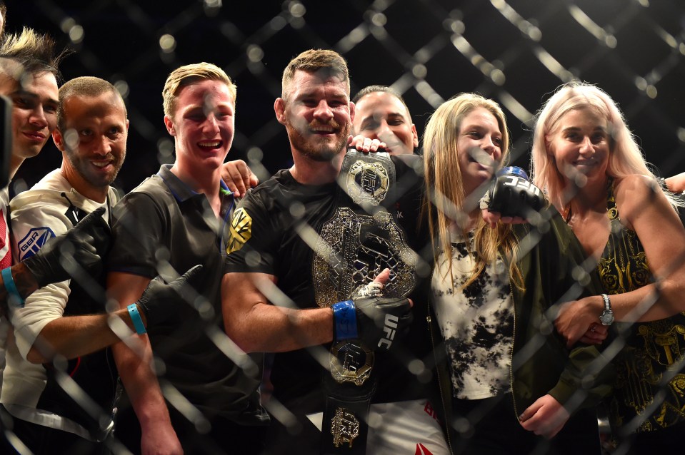  Best of British: Bisping celebrates with his team and family after his stunning victory