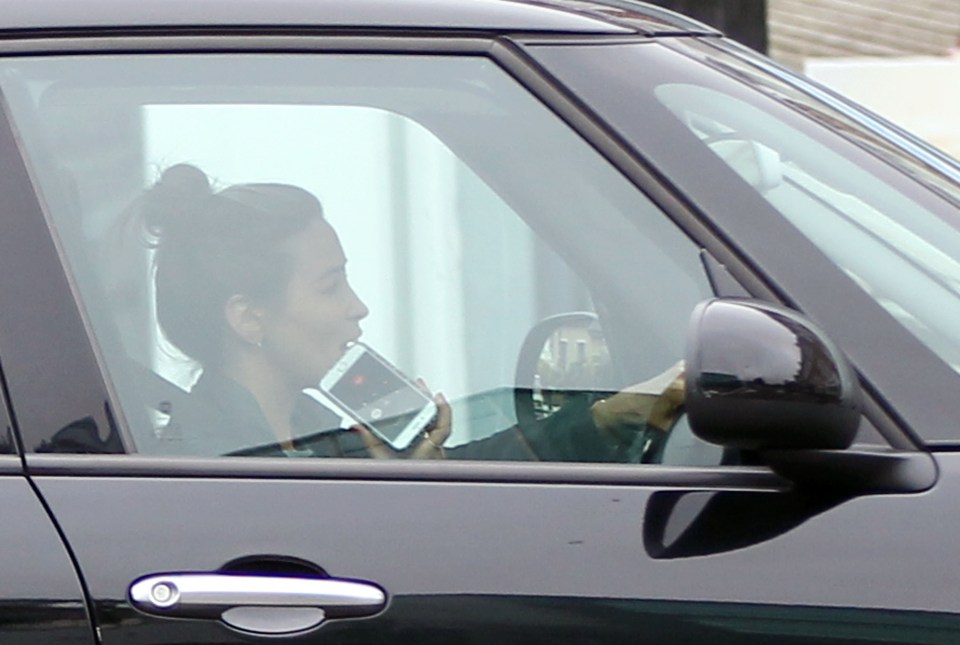  Rachel is seen at the wheel of her car