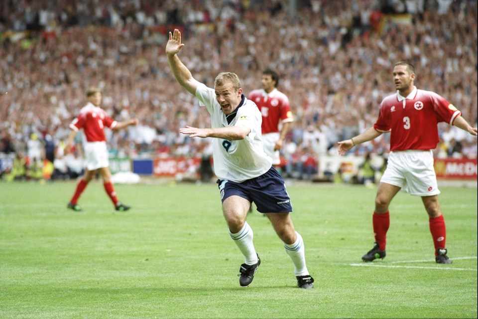 Alan Shearer with his trademark celebration after putting England ahead against Switzerland