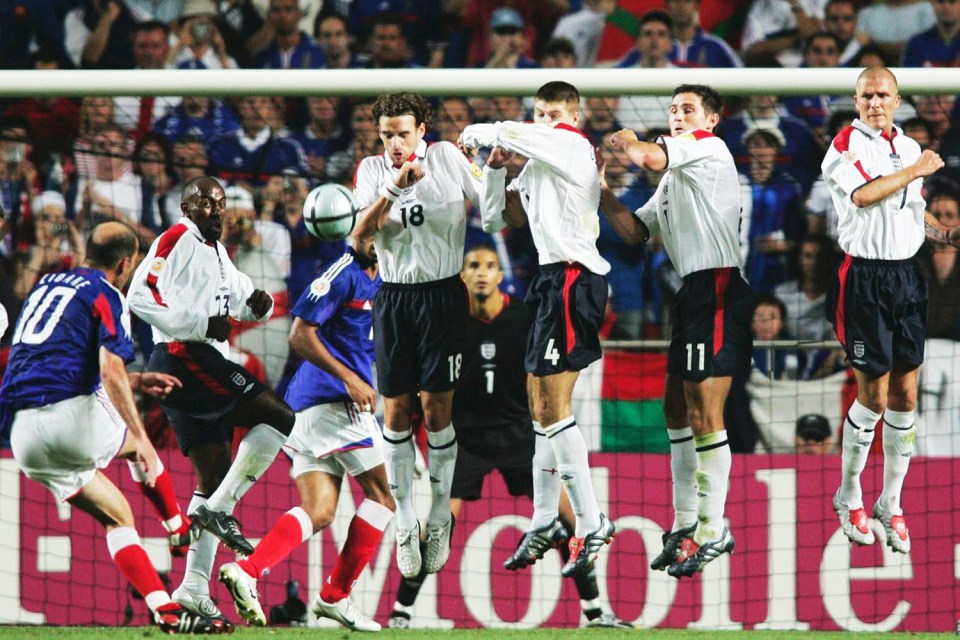 Zinedine Zidane curls in a 90th-minute free-kick to equalise for France - he scored the winner three minutes later