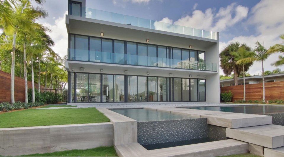  The outdoor pool is stunning, as are the sleek lines on the Miami mansion