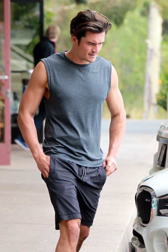  Orlando Bloom shown off his bulging biceps during an intense training session in Malibu on Wednesday