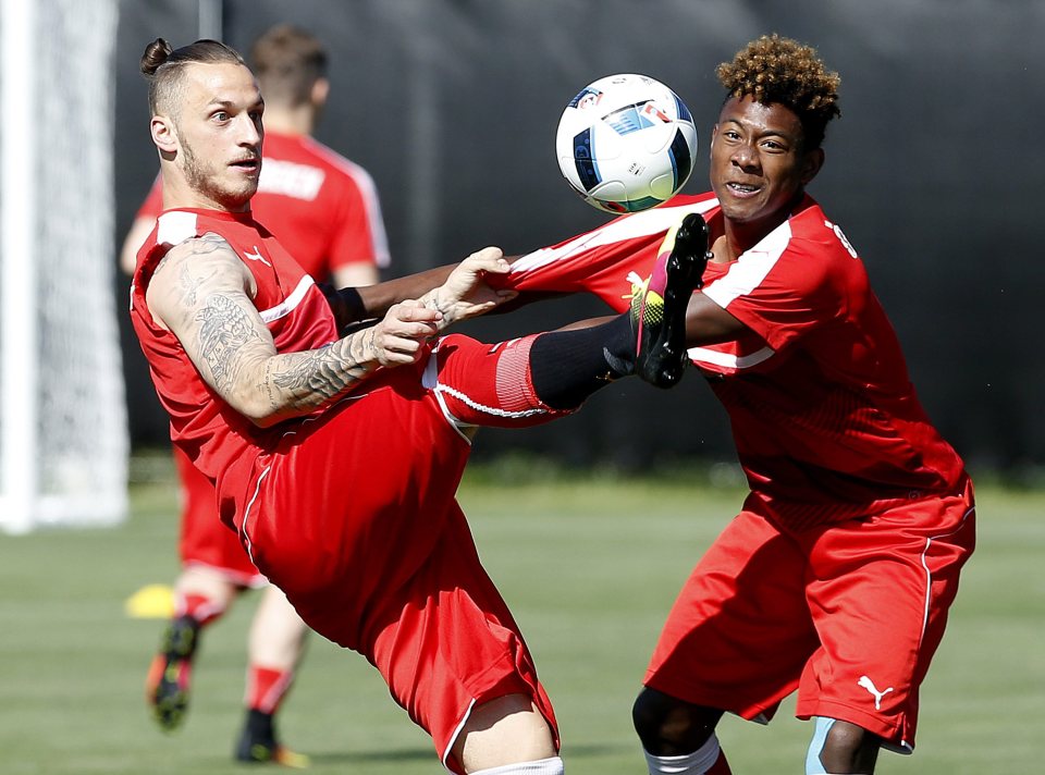  Marko Arnautovic competes with Euro 2016 team-mate, David Alaba, in Austria training