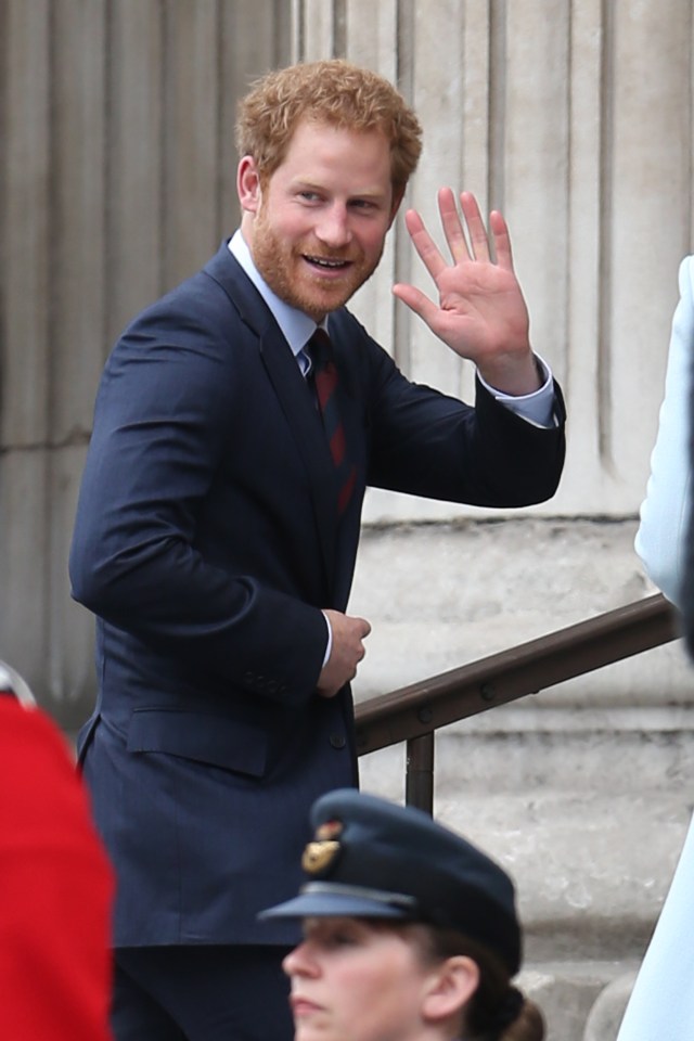  Prince Harry waves to well-wishers at the service at St Paul's Cathedral