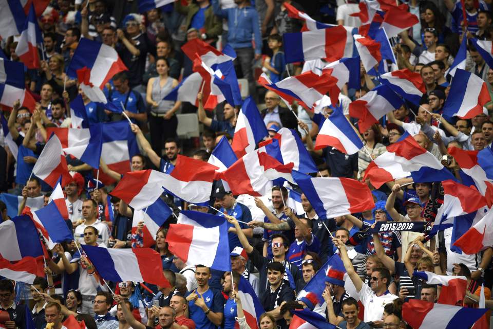  French supporters wave tricolore during the Euro opening ceremony