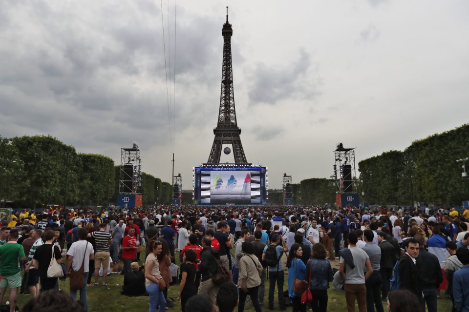  Fans gather at the Fanzone in Paris to watch the opening game