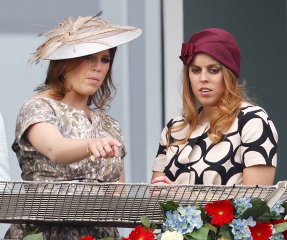  Beatrice and Eugenie look glum in their nutty hats at the races