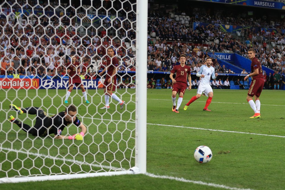  Lallana watches as another effort passes narrowly wide of the bottom corner