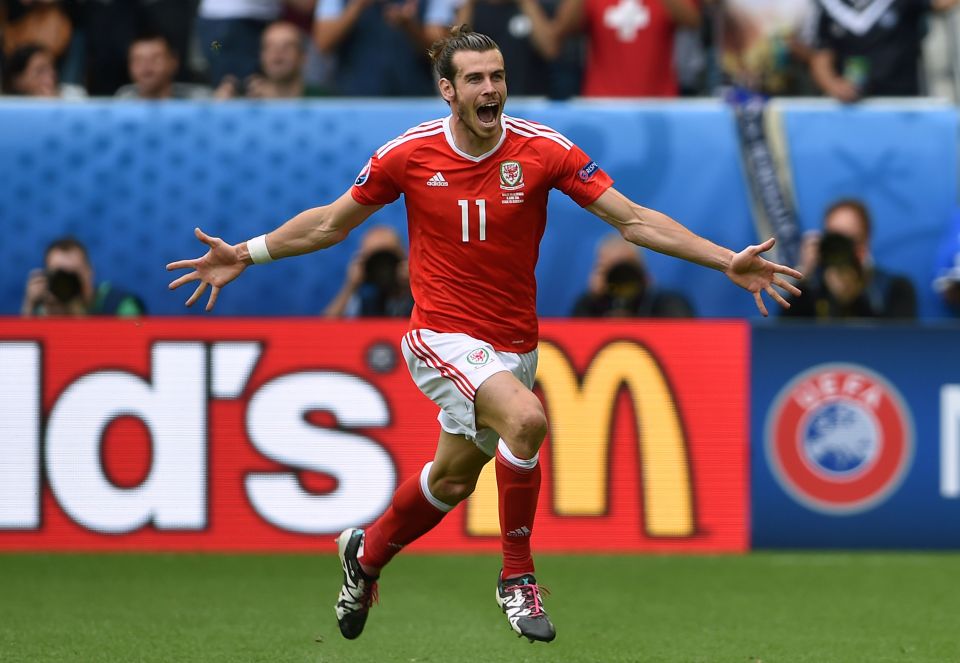 Wales' Gareth Bale celebrates scoring the opening goal during the UEFA Euro 2016, Group B match at the Stade de Bordeaux, Bordeaux. PRESS ASSOCIATION Photo. Picture date: Saturday June 11, 2016. See PA story SOCCER Wales. Photo credit should read: Joe Giddens/PA Wire. RESTRICTIONS: Use subject to restrictions. Editorial use only. Book and magazine sales permitted providing not solely devoted to any one team/player/match. No commercial use. Call +44 (0)1158 447447 for further information.