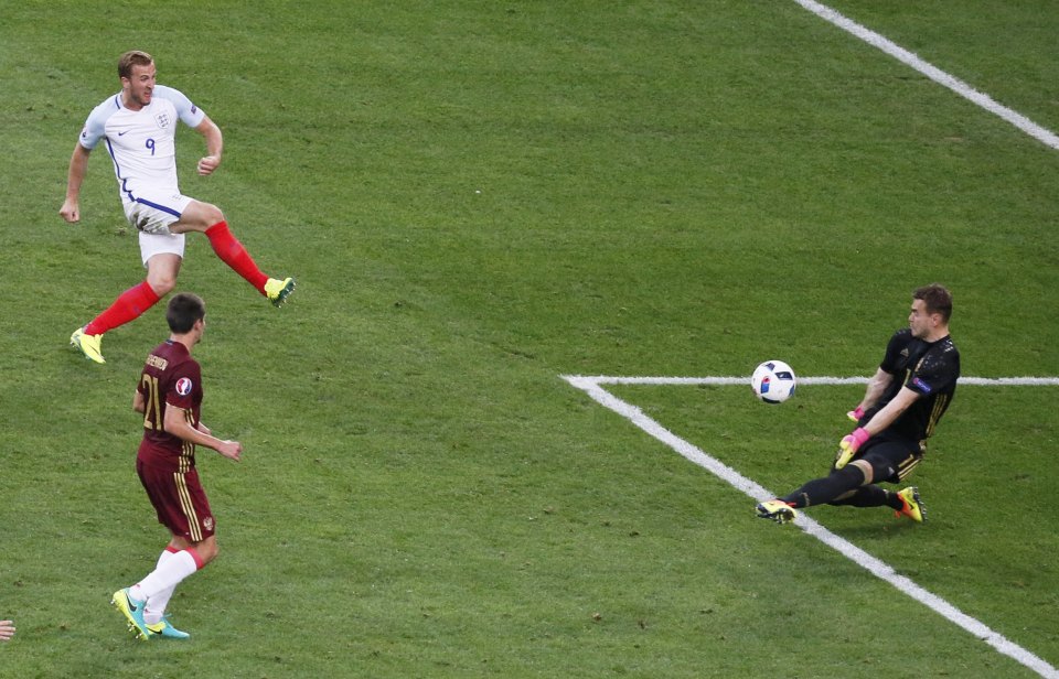 Football Soccer - England v Russia - EURO 2016 - Group B - Stade Velodrome, Marseille, France - 11/6/16 - England's Harry Kane challenges Russia's goalkeeper Igor Akinfeev. REUTERS/Robert Pratta