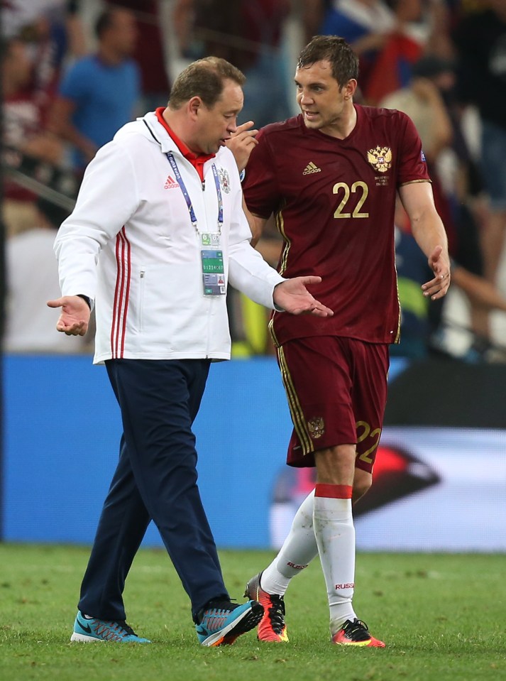  Russia boss Leonid Slutsky after the game with target man Dzyuba