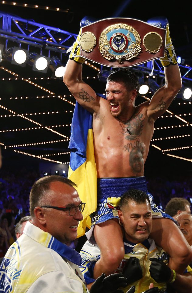 Vasyl Lomachenko holds the WBO title that he won after destroying Roman Martinez