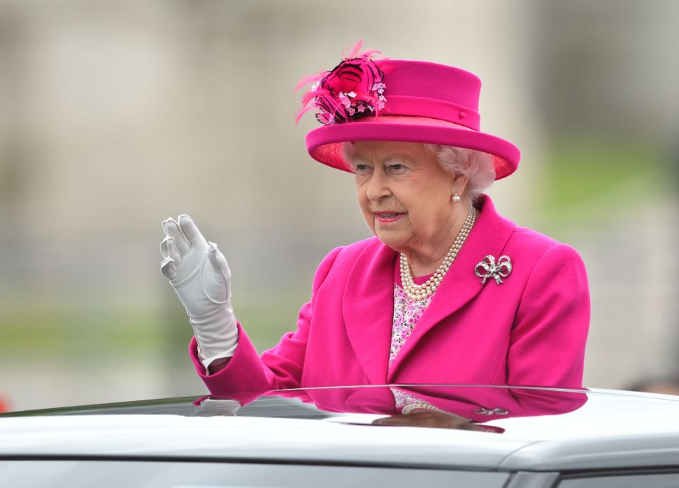  Her majesty waved from an open top Range Rover