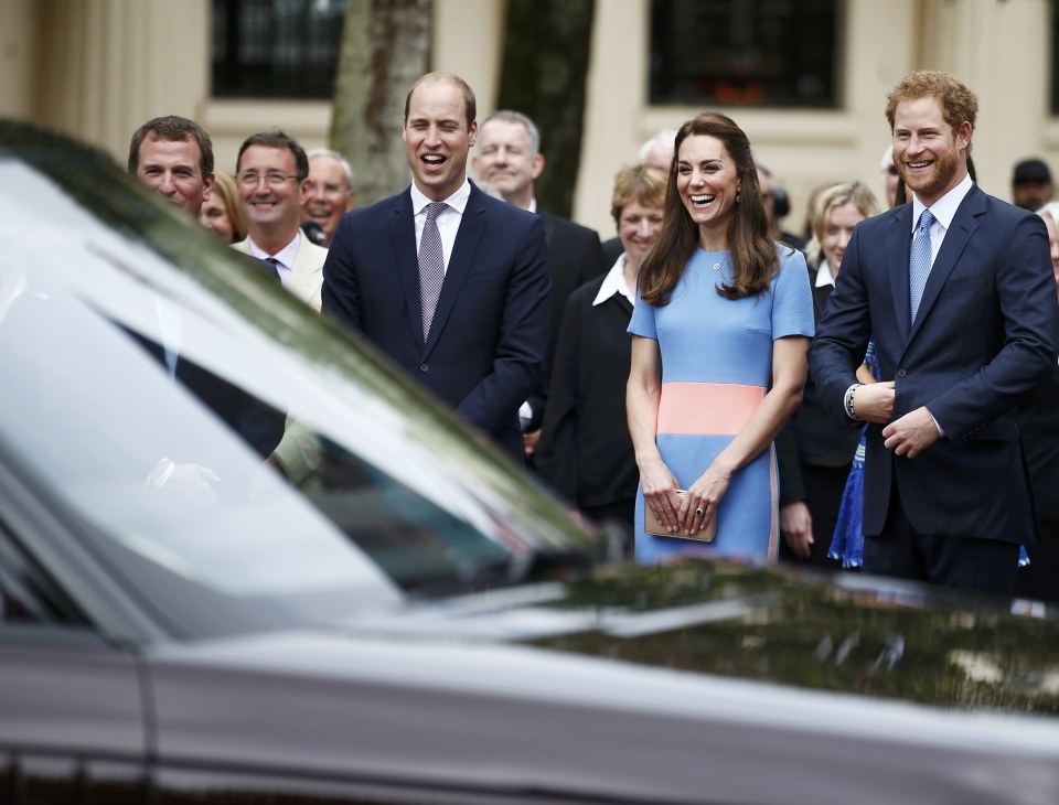  Prince's William and Harry along with The Duchess of Cambridge smile as the Queen arrives