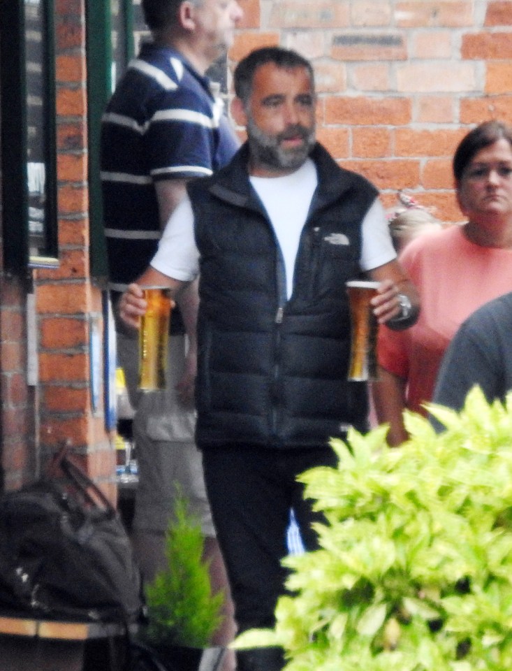 Coronation Street star Michael Le Vell seen carrying two pints of beer at his local pub