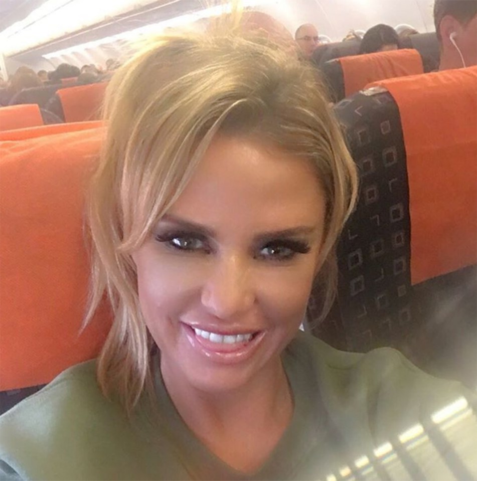 Katie looked fresh face as she flew back from Brussels after she had her implants removed