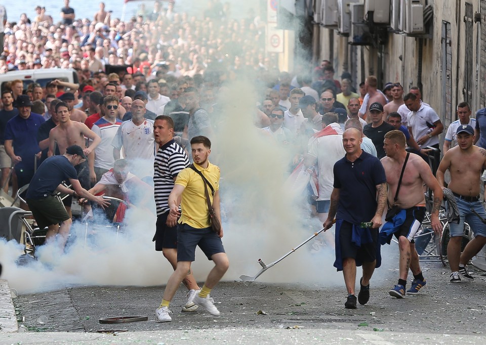 Police tear gassed the crowds after violence broke out between fans