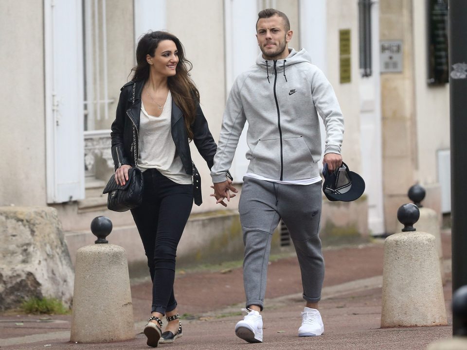  Lull before the Euro storm...Wilshere enjoys a stroll with fiance Andriani Michael