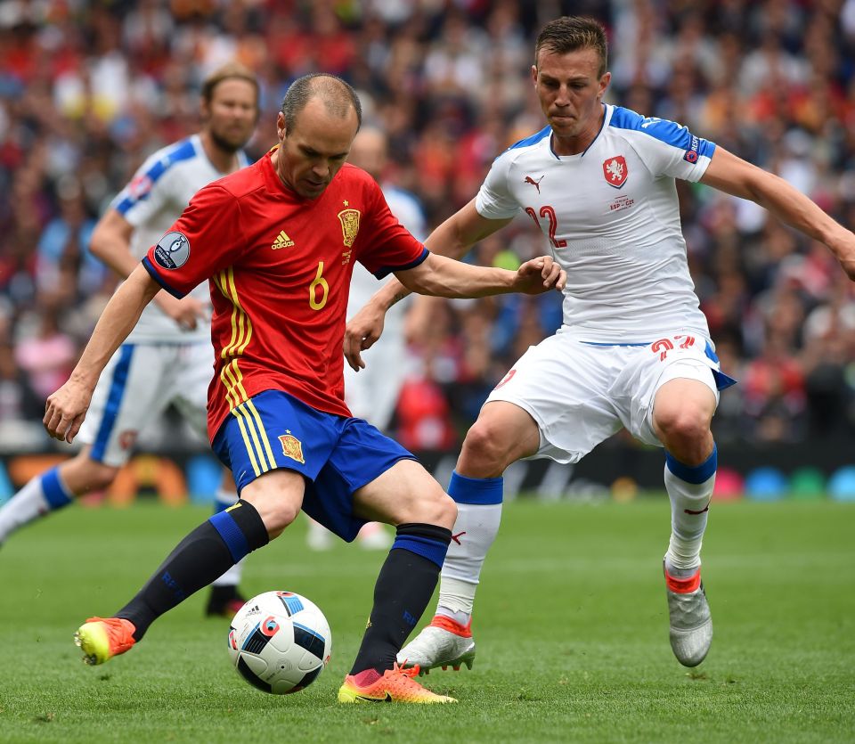 Andres Iniesta inspired defending champions Spain to a victory over Croatia