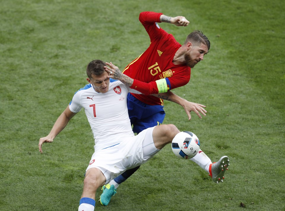 Sergio Ramos challenges Czech Republic's Tomas Necid for the ball