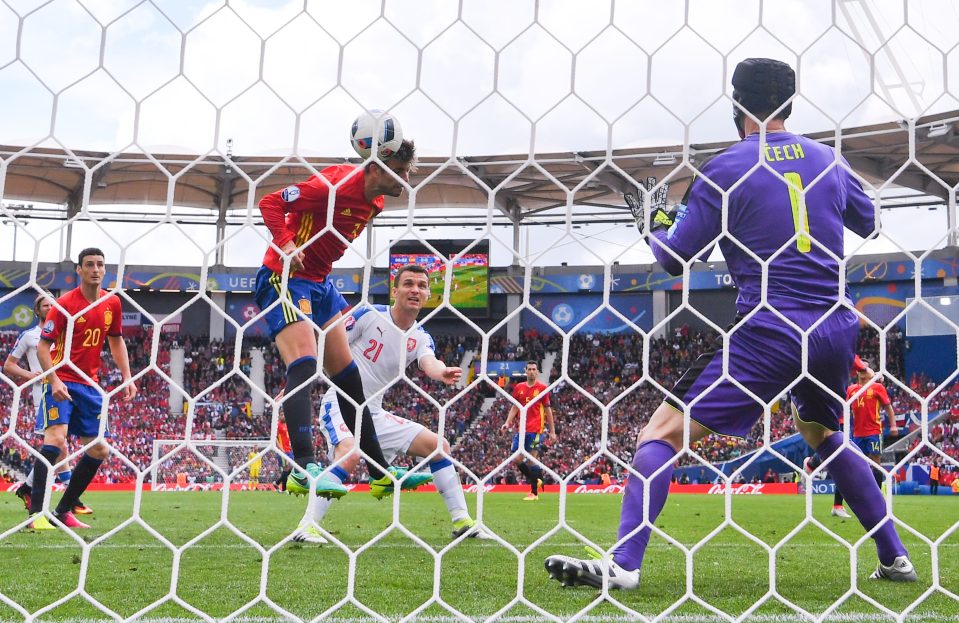 Gerard Pique scores the only goal as Spain won their opening fixture