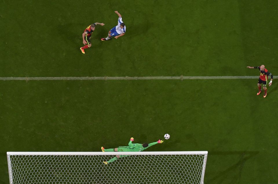 Italy's goalkeeper Gianluigi Buffon jump