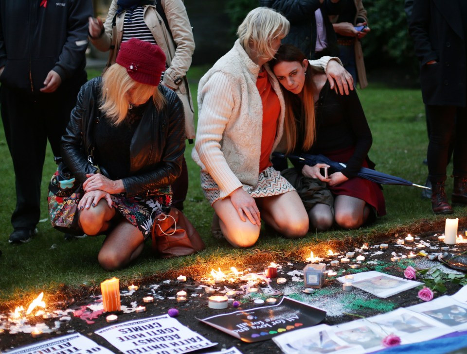  Tribute ... Candles and messages were laid at Saint Anne's Church in Soho