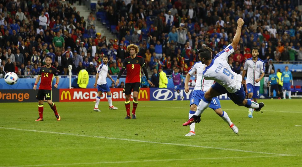  Wallop...Graziano Pelle thunders home a terrific volley for Italy's second goal