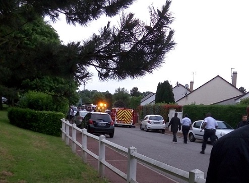 Police outside the property where a family were taken hostage yesterday