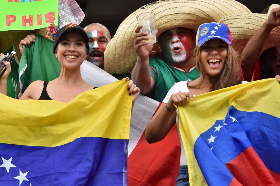 Supporters of Mexico and Venezuela wait for the start of the Copa America Centenario football tournament match between their nations in Houston, Texas, United States, on June 13, 2016. / AFP PHOTO / NELSON ALMEIDANELSON ALMEIDA/AFP/Getty Images