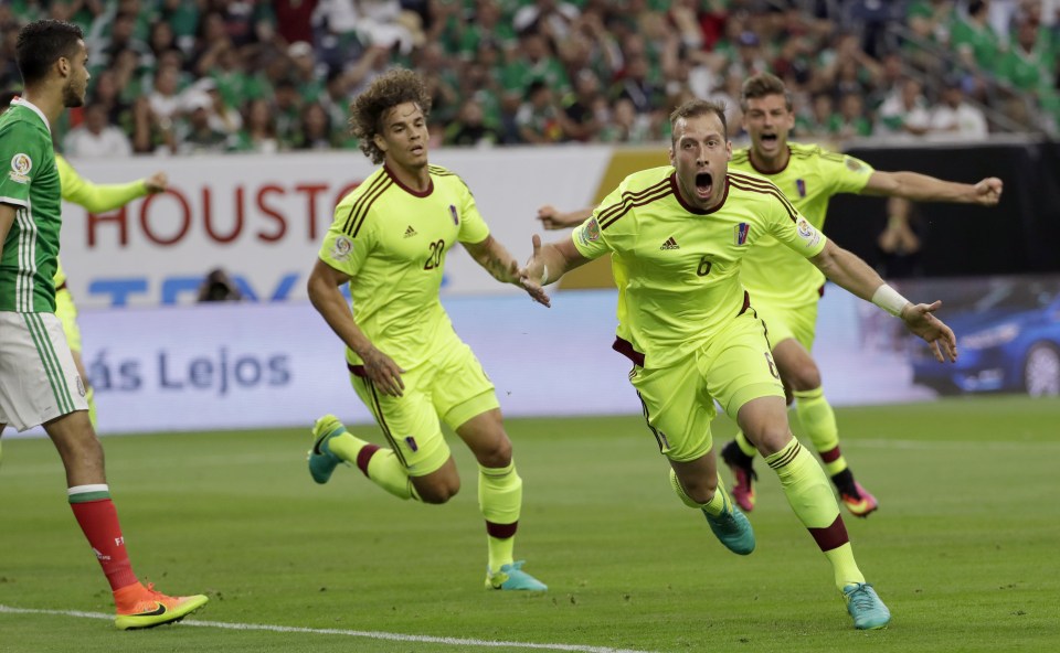 Venezuela defender Jose Manuel Velazquez (6) celebrates his goal against Mexico during the first half of a Copa America Centenario group C soccer match, Monday, June 13, 2016, in Houston. (AP Photo/David J. Phillip)