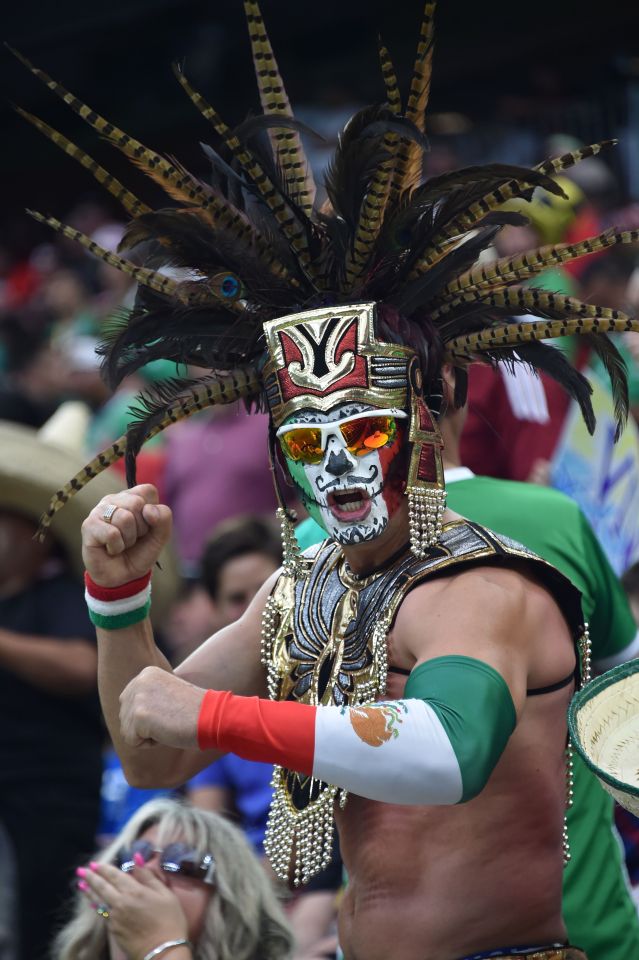 A supporter of Mexico waits for the start of the Copa America Centenario football tournament match against Venezuela in Houston, Texas, United States, on June 13, 2016. / AFP PHOTO / Nelson ALMEIDANELSON ALMEIDA/AFP/Getty Images