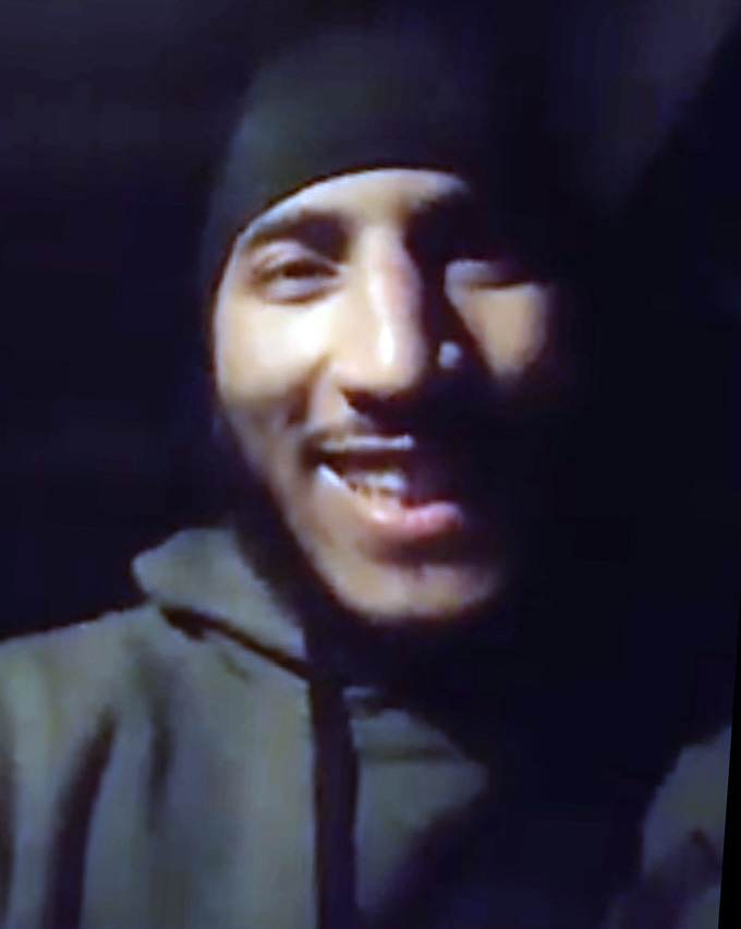 The grinning jihadi posted a sick video of his crimes to Facebook justifying his murderous actions