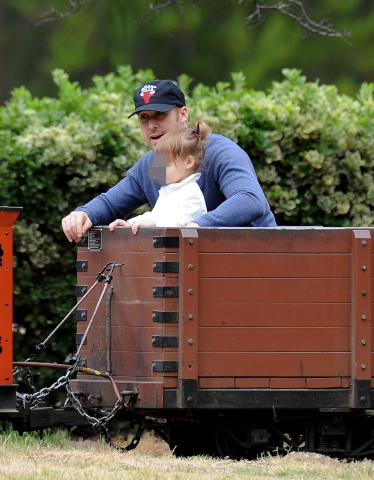 The actor appeared rather animated as he rode the Southern Railroad around the park. 