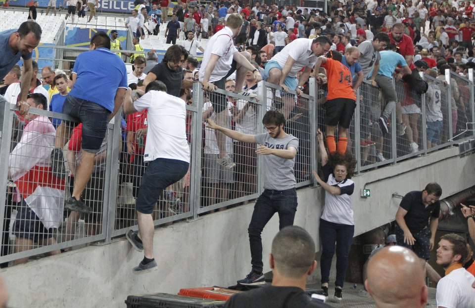 Spectators tried to escape from Russian supporters who went on a charge in the stands right after the Euro 2016 Group B soccer match between England and Russia