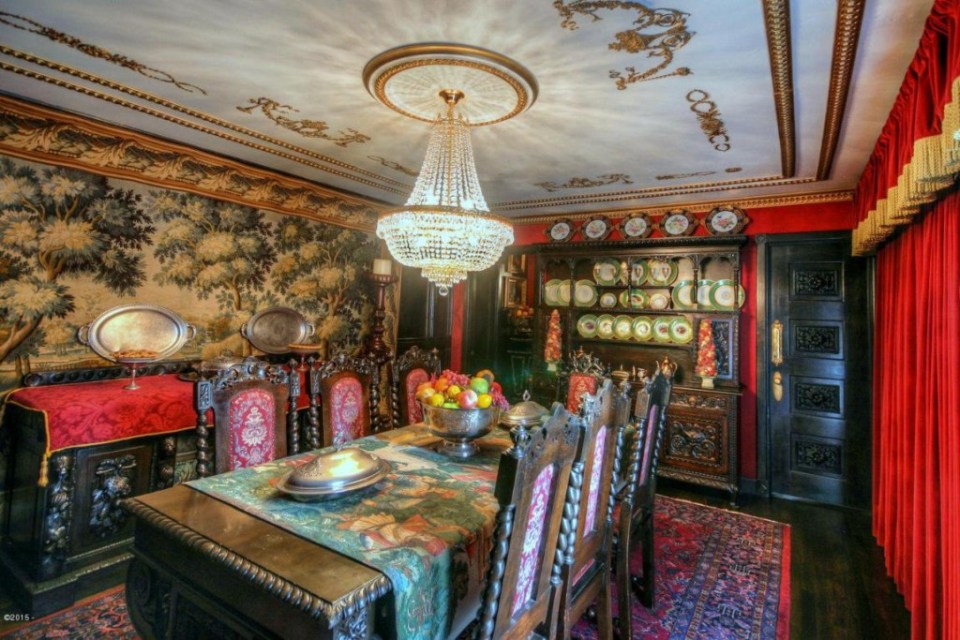  The dining room is filled with antique furniture imported from Europe