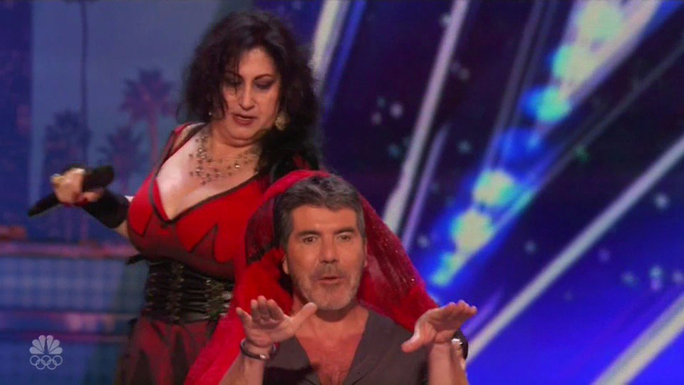  Miranda continues her saucy dance around Simon