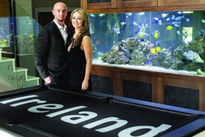  The couple were happy to show off their a £100,000 fish tank and the pool table with "Ireland" written on it