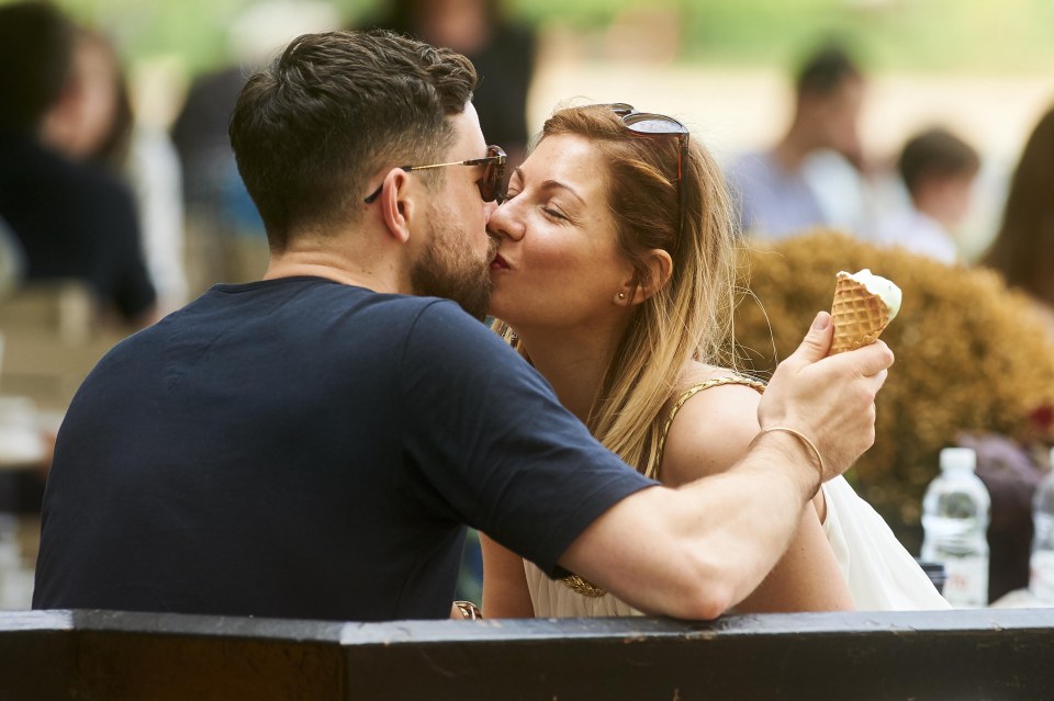 CiCi looks like she's off the market as she kisses mystery man