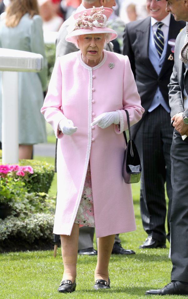 The Queen, a keen racegoer, arrives in a pale pink ensemble ready for her second day the the Royal Ascot festival