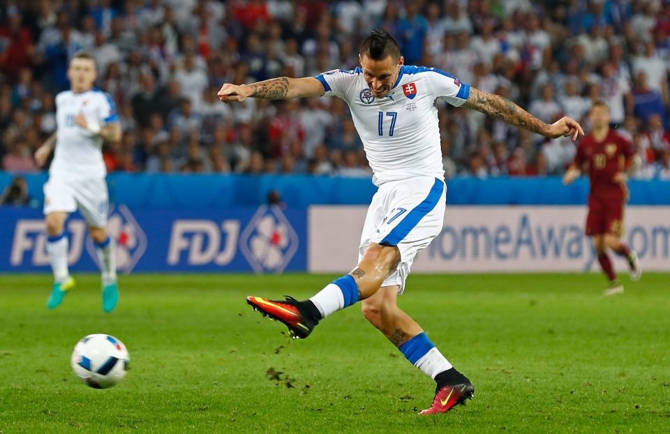  Striker Marek Hamsik has a shot on goal for Slovakia against Russia